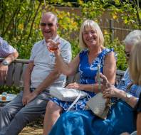 Summertime chats in the gardens at Mayfield Watford