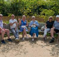 Summertime chats in the gardens at Mayfield Watford