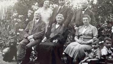 A picture of Mr Fieldsend's parents (back left and centre) grandparents (back right & front left) Mr Fieldsend (front right ) his brother (next to him on the right)